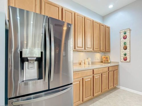 5690 Lago Villaggio Way, Naples FL  34104-5739 exterior