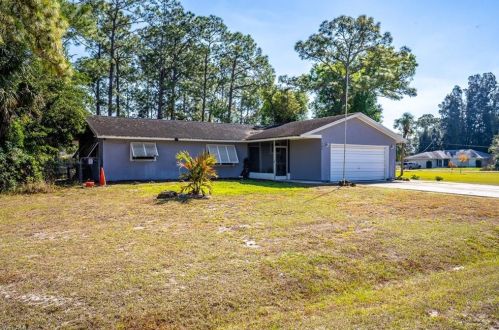 302 Mcarthur Ave, Lehigh Acres, FL 33936-1652