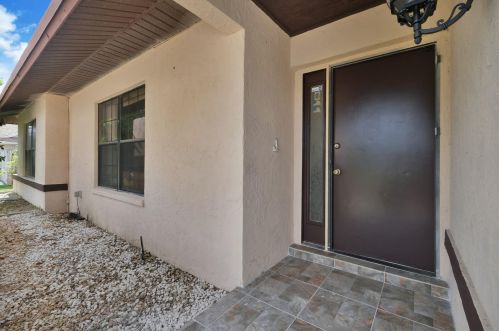 1527 Chapparel Way, West Palm Beach, FL 33414-5870