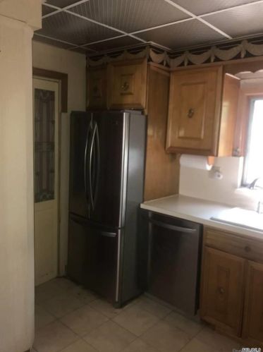 87-11 Santiago St, Jamaica, NY 11423-1115