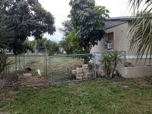 1114 Cherokee Ave, Lehigh Acres FL 33936-6856 exterior