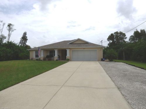 324 Parkdale Blvd, Lehigh Acres, FL 33974-9681