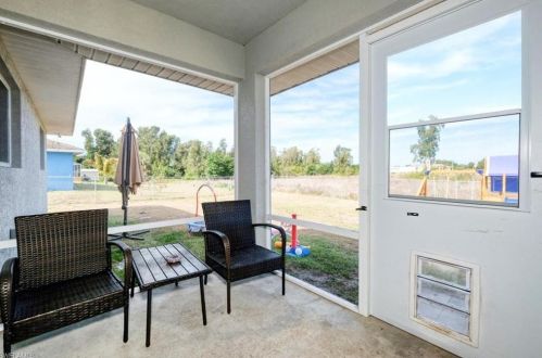 386 Palora Ave, Lehigh Acres FL 33974-9458 exterior