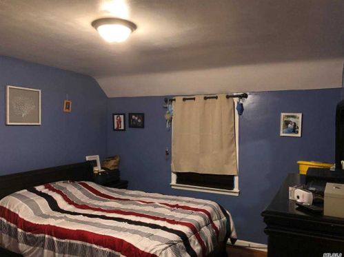 93 Henry St, Roosevelt NY  11575-1304 exterior