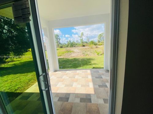 1821 Ridgemoor St, Lehigh Acres FL 33972-1080 exterior