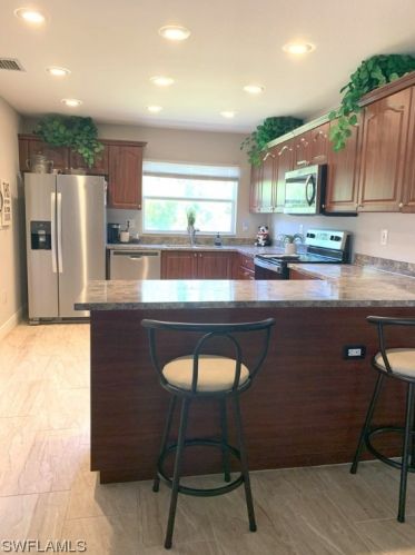 827 Hector Ln, Lehigh Acres, FL 33974-2620