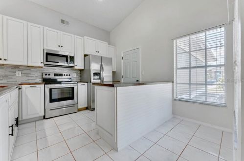 2302 Merrimack Dr, Kissimmee FL 34743-7899 exterior