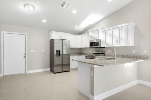 834 Chantilly St, Lehigh Acres FL 33974-4732 exterior