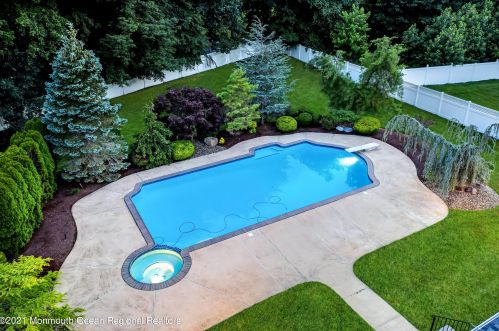 142 Serpentine Dr, Morganville NJ  07751-1400 exterior