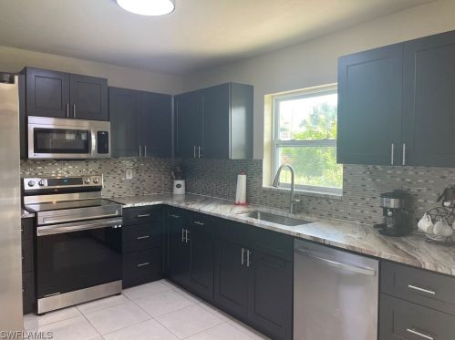 206 Floyd Ave, Lehigh Acres FL 33971-1716 exterior