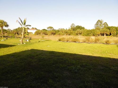 213 Shadow Lakes Dr, Lehigh Acres FL  33974-0806 exterior