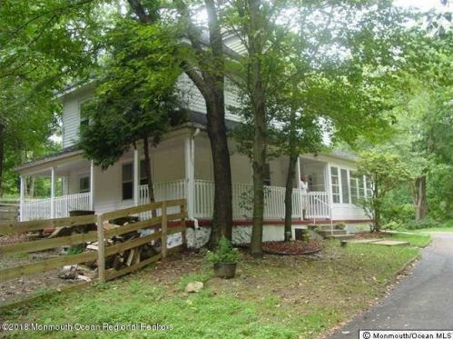 63 Reids Hill Rd, Morganville, NJ 07751-4209