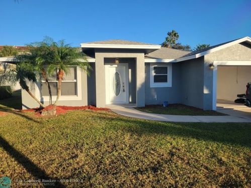 149 Dabou Loop, Belle Glade FL  33430-4284 exterior