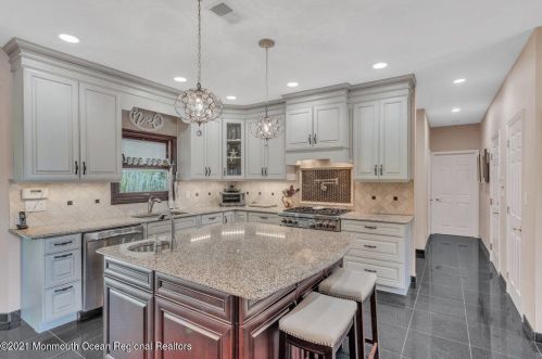 142 Serpentine Dr, Morganville NJ  07751-1400 exterior