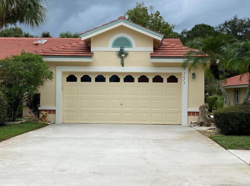 3673 Whispering Sound Dr, Palm City, FL 34990-7727