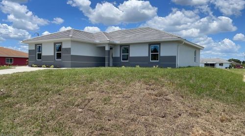 729 Hightower Ave, Lehigh Acres, FL 33973-2693