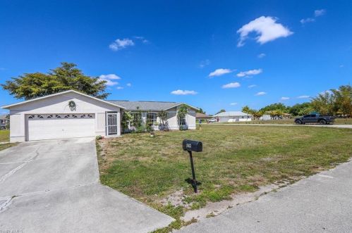 1663 Cheshire Cir, Lehigh Acres, FL 33936-0077