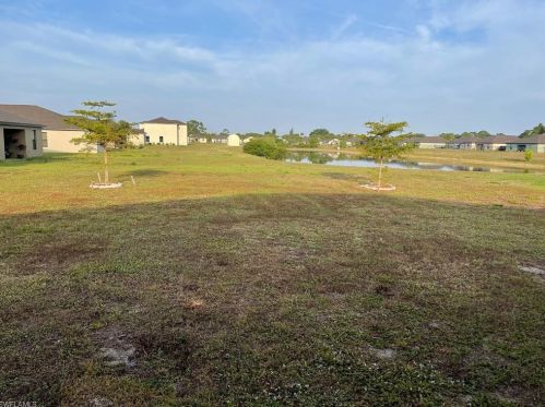 128 Shadow Lakes Dr, Lehigh Acres FL  33974-0803 exterior