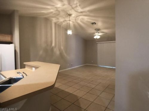 609 Hawthorne Ave, Lehigh Acres FL  33974-9712 exterior