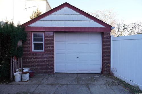 104-07 97th Ave, Jamaica, NY 11416-1022