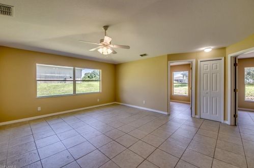 217 Ivan Ave, Lehigh Acres FL 33973-2011 exterior