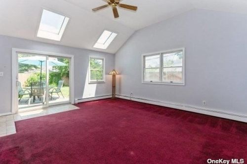 11 Lotus Ln, Westbury NY  11590-6320 exterior