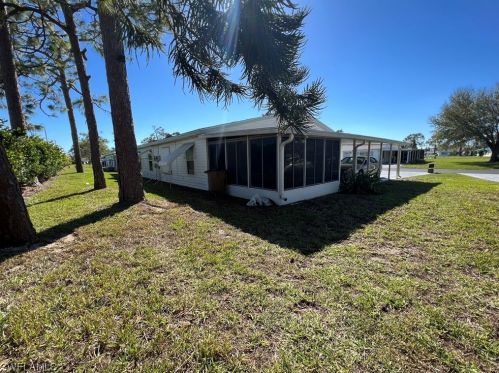 14 Desert Candle Cir, Lehigh Acres FL 33936-7360 exterior