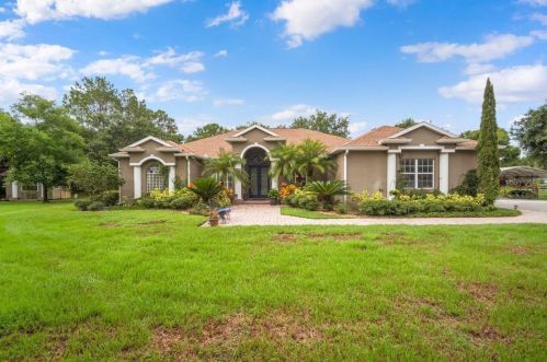 1008 Silver Spurs Cir, Wimauma, FL 33598-7613