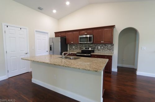 712 Johns Ave, Lehigh Acres FL  33972-4641 exterior