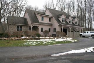 9949 Huron Creek Dr, Four Mile Lk, MI 48130-9685