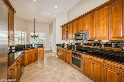 11982 Heather Woods Ct, Naples FL  34120-4398 exterior